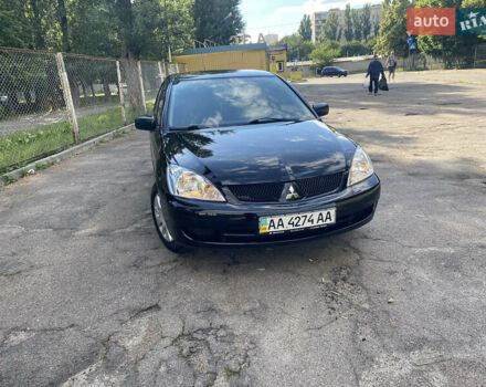 Чорний Міцубісі Lancer, об'ємом двигуна 1.58 л та пробігом 180 тис. км за 5200 $, фото 1 на Automoto.ua