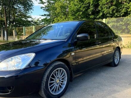 Міцубісі Lancer 2006 у Болграде на Automoto.ua Чорний Міцубісі Lancer, об'ємом двигуна 1.6 л та пробігом 195 тис. км за 5000 $, фото 1 на Automoto.ua