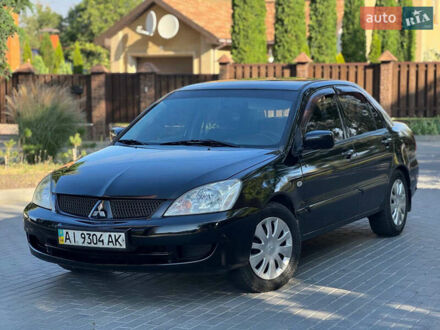 Міцубісі Lancer 2006 у Полтаві на Automoto.ua Чорний Міцубісі Lancer, об'ємом двигуна 0 л та пробігом 400 тис. км за 3200 $, фото 1 на Automoto.ua