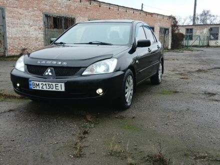 Чорний Міцубісі Lancer, об'ємом двигуна 1.6 л та пробігом 230 тис. км за 3250 $, фото 1 на Automoto.ua