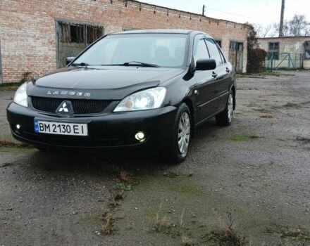 Черный Мицубиси Лансер, объемом двигателя 1.6 л и пробегом 230 тыс. км за 3250 $, фото 1 на Automoto.ua