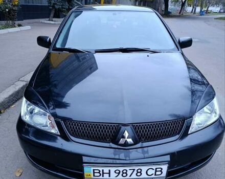 Чорний Міцубісі Lancer, об'ємом двигуна 1.6 л та пробігом 218 тис. км за 4300 $, фото 1 на Automoto.ua