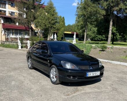 Чорний Міцубісі Lancer, об'ємом двигуна 2 л та пробігом 182 тис. км за 4650 $, фото 1 на Automoto.ua