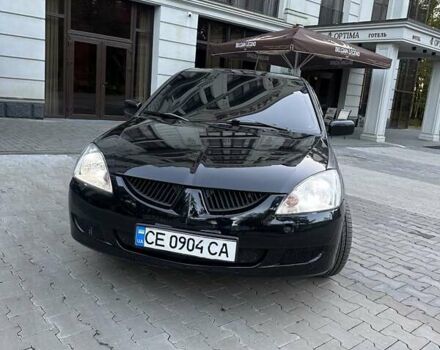 Чорний Міцубісі Lancer, об'ємом двигуна 1.58 л та пробігом 230 тис. км за 3800 $, фото 1 на Automoto.ua