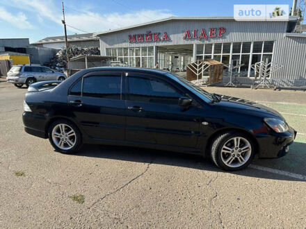 Міцубісі Lancer 2006 у Миколаєві на Automoto.ua Чорний Міцубісі Lancer, об'ємом двигуна 2 л та пробігом 212 тис. км за 5500 $, фото 1 на Automoto.ua