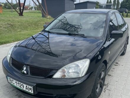 Мицубиси Лансер 2006 в Львове на Automoto.ua Черный Мицубиси Лансер, объемом двигателя 1.6 л и пробегом 340 тыс. км за 4499 $, фото 1 на Automoto.ua
