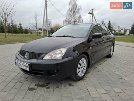 Міцубісі Lancer 2006 у Тернополі на Automoto.ua Чорний Міцубісі Lancer, об'ємом двигуна 1.6 л та пробігом 215 тис. км за 3600 $, фото 1 на Automoto.ua