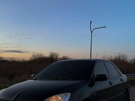 Мицубиси Лансер 2006 в Львове на Automoto.ua Черный Мицубиси Лансер, объемом двигателя 1.6 л и пробегом 306 тыс. км за 4800 $, фото 1 на Automoto.ua