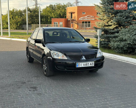 Чорний Міцубісі Lancer, об'ємом двигуна 1.58 л та пробігом 200 тис. км за 3300 $, фото 1 на Automoto.ua