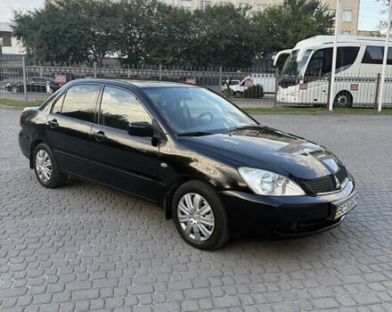 Чорний Міцубісі Lancer, об'ємом двигуна 1.6 л та пробігом 313 тис. км за 3600 $, фото 1 на Automoto.ua