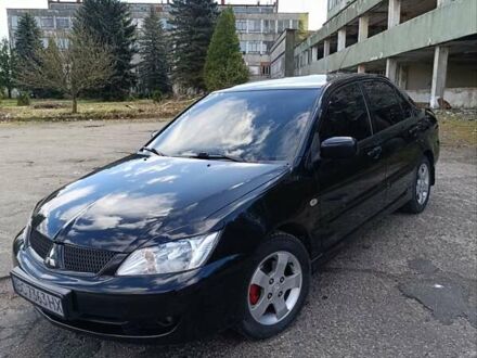 Міцубісі Lancer 2006 у Новий Розділ на Automoto.ua Чорний Міцубісі Lancer, об'ємом двигуна 1.6 л та пробігом 242 тис. км за 4500 $, фото 1 на Automoto.ua