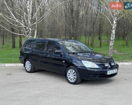 Черный Мицубиси Лансер, объемом двигателя 1.58 л и пробегом 323 тыс. км за 2999 $, фото 1 на Automoto.ua