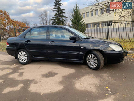Міцубісі Lancer 2006 у Харкові на Automoto.ua Чорний Міцубісі Lancer, об'ємом двигуна 1.58 л та пробігом 195 тис. км за 4800 $, фото 1 на Automoto.ua