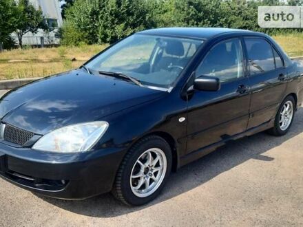 Міцубісі Lancer 2006 у Черкасах на Automoto.ua Чорний Міцубісі Lancer, об'ємом двигуна 1.58 л та пробігом 216 тис. км за 4400 $, фото 1 на Automoto.ua