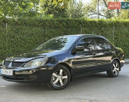 Чорний Міцубісі Lancer, об'ємом двигуна 1.6 л та пробігом 203 тис. км за 4600 $, фото 1 на Automoto.ua