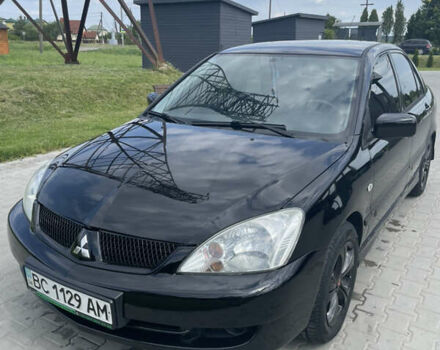 Чорний Міцубісі Lancer, об'ємом двигуна 1.58 л та пробігом 340 тис. км за 4199 $, фото 1 на Automoto.ua