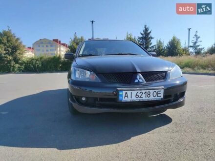 Міцубісі Lancer 2006 у Києві на Automoto.ua Чорний Міцубісі Lancer, об'ємом двигуна 2 л та пробігом 251 тис. км за 5500 $, фото 1 на Automoto.ua