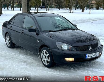 Чорний Міцубісі Lancer, об'ємом двигуна 1.6 л та пробігом 270 тис. км за 2900 $, фото 1 на Automoto.ua