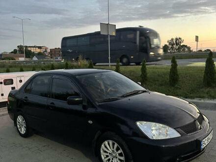 Міцубісі Lancer 2006 у Львові на Automoto.ua Чорний Міцубісі Lancer, об'ємом двигуна 1.6 л та пробігом 148 тис. км за 4400 $, фото 1 на Automoto.ua