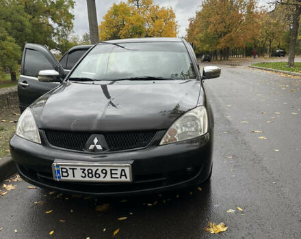 Чорний Міцубісі Lancer, об'ємом двигуна 1.6 л та пробігом 380 тис. км за 5000 $, фото 1 на Automoto.ua