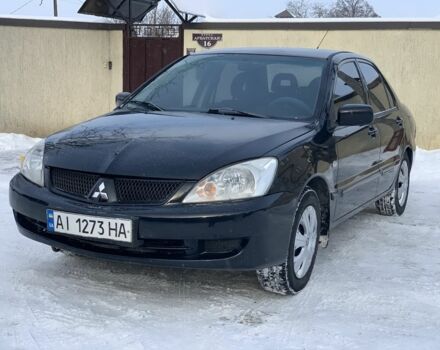 Чорний Міцубісі Lancer, об'ємом двигуна 1.6 л та пробігом 237 тис. км за 3850 $, фото 1 на Automoto.ua