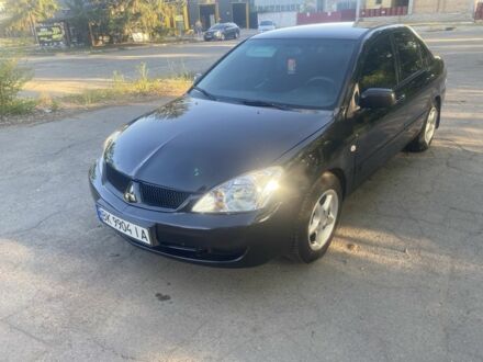 Міцубісі Lancer 2006 у Кривому Розі на Automoto.ua Чорний Міцубісі Lancer, об'ємом двигуна 1.6 л та пробігом 306 тис. км за 3650 $, фото 1 на Automoto.ua