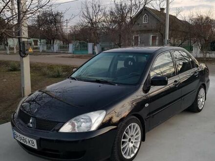 Чорний Міцубісі Lancer, об'ємом двигуна 0 л та пробігом 230 тис. км за 4850 $, фото 1 на Automoto.ua