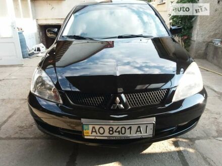 Міцубісі Lancer 2006 у Тячеве на Automoto.ua Чорний Міцубісі Lancer, об'ємом двигуна 1.6 л та пробігом 325 тис. км за 4300 $, фото 1 на Automoto.ua