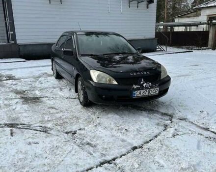 Чорний Міцубісі Lancer, об'ємом двигуна 1.6 л та пробігом 257 тис. км за 4000 $, фото 1 на Automoto.ua