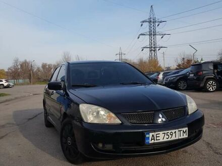 Чорний Міцубісі Lancer, об'ємом двигуна 1.58 л та пробігом 290 тис. км за 3200 $, фото 1 на Automoto.ua