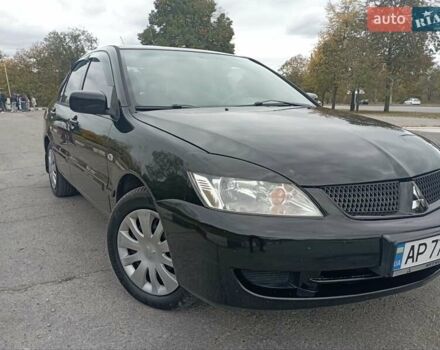 Чорний Міцубісі Lancer, об'ємом двигуна 1.6 л та пробігом 207 тис. км за 4500 $, фото 1 на Automoto.ua