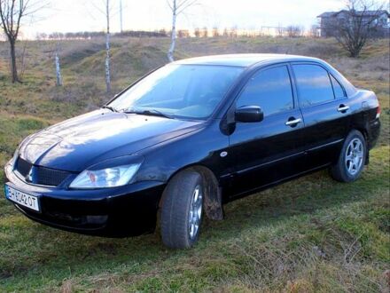 Мицубиси Лансер 2006 в Белгород-Днестровском на Automoto.ua Черный Мицубиси Лансер, объемом двигателя 1.6 л и пробегом 218 тыс. км за 4400 $, фото 1 на Automoto.ua