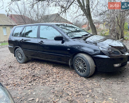 Чорний Міцубісі Lancer, об'ємом двигуна 1.6 л та пробігом 220 тис. км за 5500 $, фото 1 на Automoto.ua