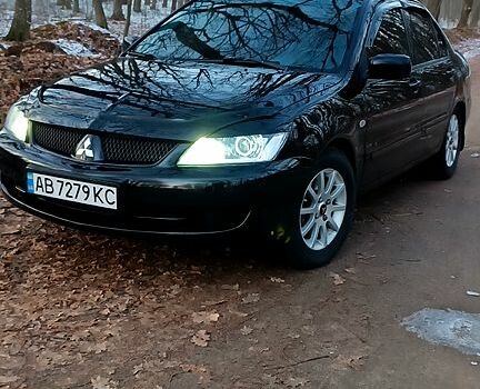Чорний Міцубісі Lancer, об'ємом двигуна 1.6 л та пробігом 345 тис. км за 3700 $, фото 1 на Automoto.ua