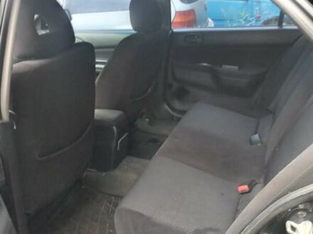 Міцубісі Lancer 2006 у Харкові на Automoto.ua Чорний Міцубісі Lancer, об'ємом двигуна 1.6 л та пробігом 220 тис. км за 2500 $, фото 1 на Automoto.ua