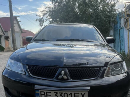 Мицубиси Лансер 2006 в Николаеве на Automoto.ua Черный Мицубиси Лансер, объемом двигателя 1.6 л и пробегом 200 тыс. км за 4500 $, фото 1 на Automoto.ua