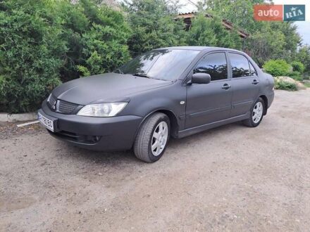 Чорний Міцубісі Lancer, об'ємом двигуна 1.58 л та пробігом 280 тис. км за 3950 $, фото 1 на Automoto.ua