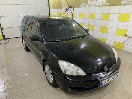 Чорний Міцубісі Lancer, об'ємом двигуна 1 л та пробігом 200 тис. км за 3700 $, фото 1 на Automoto.ua