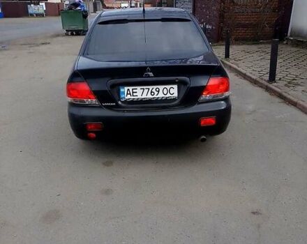 Чорний Міцубісі Lancer, об'ємом двигуна 1.6 л та пробігом 218 тис. км за 4444 $, фото 1 на Automoto.ua