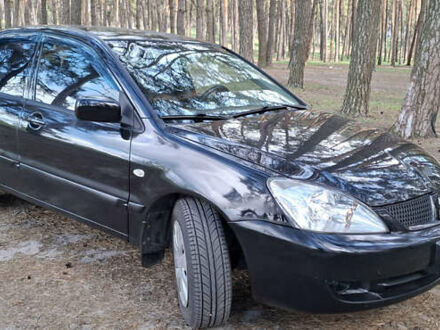 Міцубісі Lancer 2006 у Сумах на Automoto.ua Чорний Міцубісі Lancer, об'ємом двигуна 1.58 л та пробігом 220 тис. км за 3500 $, фото 1 на Automoto.ua