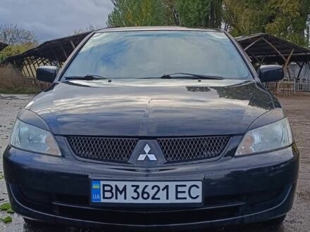 Чорний Міцубісі Lancer, об'ємом двигуна 1.6 л та пробігом 250 тис. км за 4000 $, фото 1 на Automoto.ua
