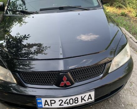 Чорний Міцубісі Lancer, об'ємом двигуна 1.6 л та пробігом 300 тис. км за 4700 $, фото 1 на Automoto.ua