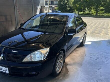 Міцубісі Lancer 2006 у Великом Березном на Automoto.ua Чорний Міцубісі Lancer, об'ємом двигуна 1.6 л та пробігом 330 тис. км за 3200 $, фото 1 на Automoto.ua