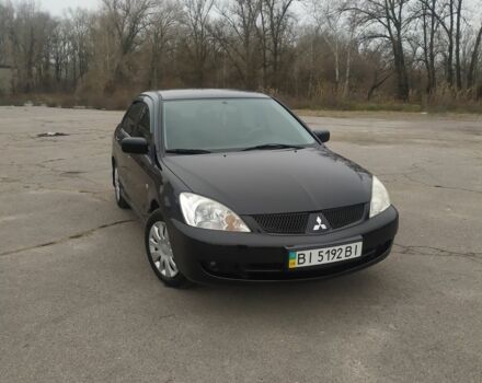 Черный Мицубиси Лансер, объемом двигателя 0 л и пробегом 170 тыс. км за 4000 $, фото 1 на Automoto.ua