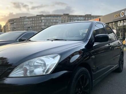 Міцубісі Lancer 2006 у Кривому Розі на Automoto.ua Чорний Міцубісі Lancer, об'ємом двигуна 1.6 л та пробігом 203 тис. км за 4299 $, фото 1 на Automoto.ua