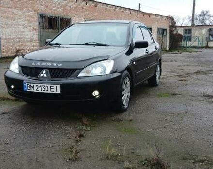 Чорний Міцубісі Lancer, об'ємом двигуна 1.6 л та пробігом 230 тис. км за 3250 $, фото 1 на Automoto.ua