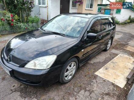 Чорний Міцубісі Lancer, об'ємом двигуна 1.6 л та пробігом 280 тис. км за 4500 $, фото 1 на Automoto.ua
