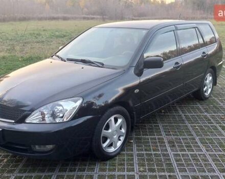 Мицубиси Лансер 2006 в Киеве на Automoto.ua Черный Мицубиси Лансер, объемом двигателя 1.58 л и пробегом 296 тыс. км за 4500 $, фото 1 на Automoto.ua