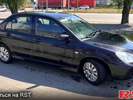 Мицубиси Лансер 2006 в Днепре (Днепропетровске) на Automoto.ua Черный Мицубиси Лансер, объемом двигателя 1.6 л и пробегом 152 тыс. км за 5500 $, фото 1 на Automoto.ua