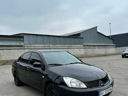 Міцубісі Lancer 2006 у Барышевке на Automoto.ua Чорний Міцубісі Lancer, об'ємом двигуна 1.58 л та пробігом 237 тис. км за 3500 $, фото 1 на Automoto.ua